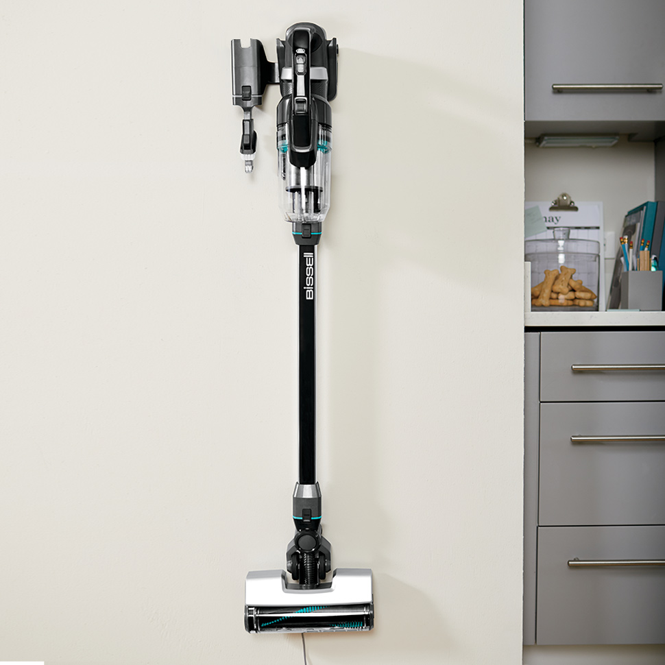 Soporte de pared y sistema de carga